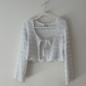 Cropped ruffle tie cardigan